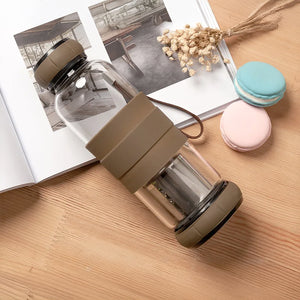 gourde en verre marron avec protection