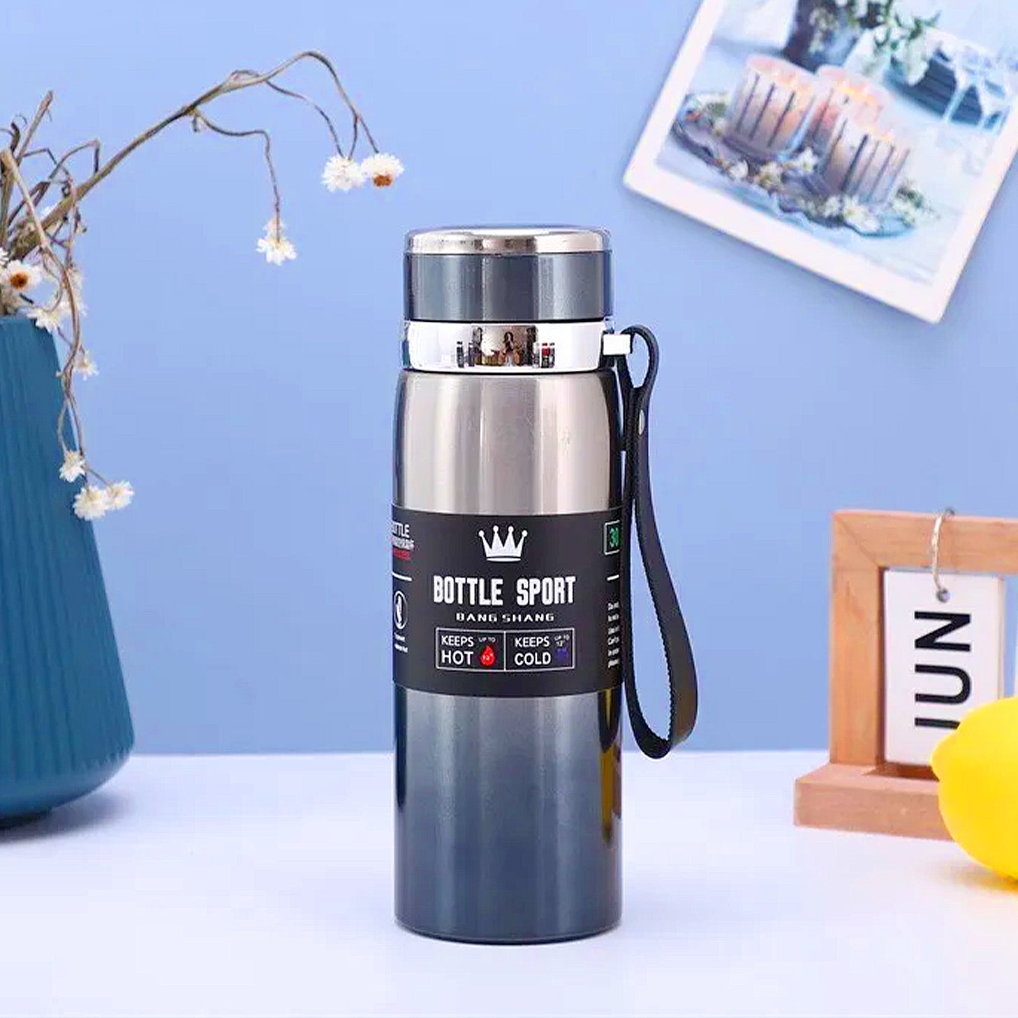 gourde isotherme bleu et argenté