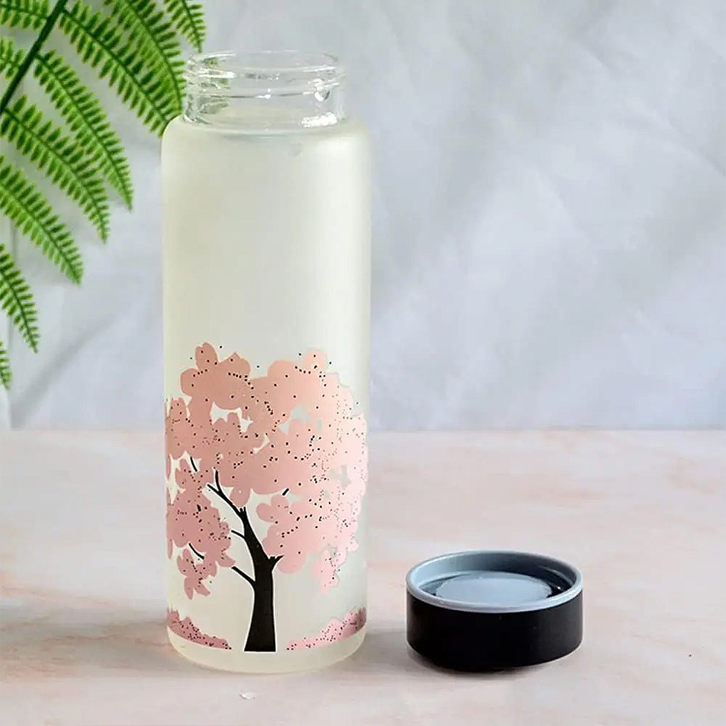 Gourde en verre avec motif fleurs