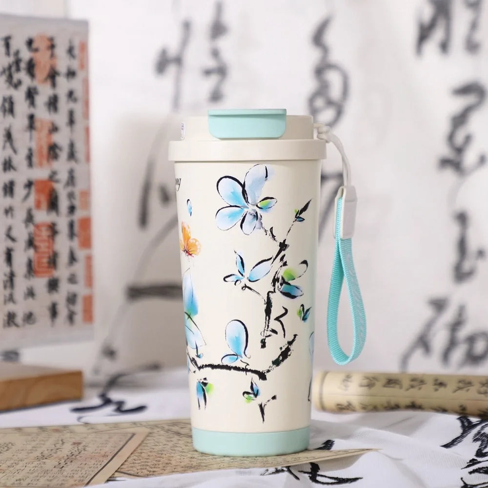 gourde thermos bleue avec dragonne